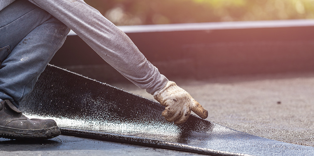 uPVC being laid down on flat roof