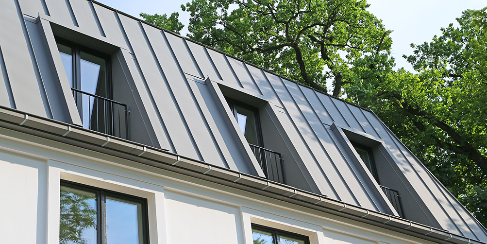 Metal roof with loft windows